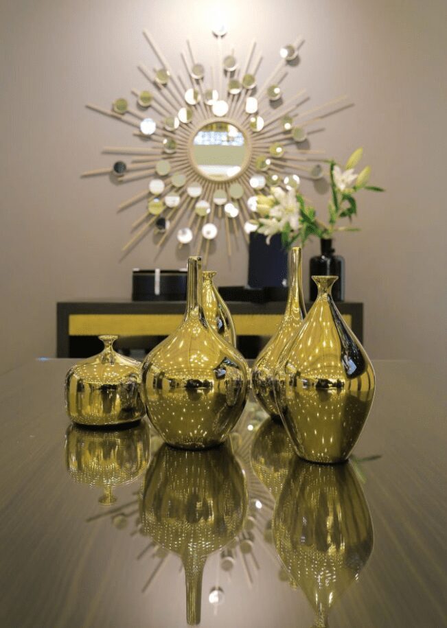 Metallic Accents on glass coffee table