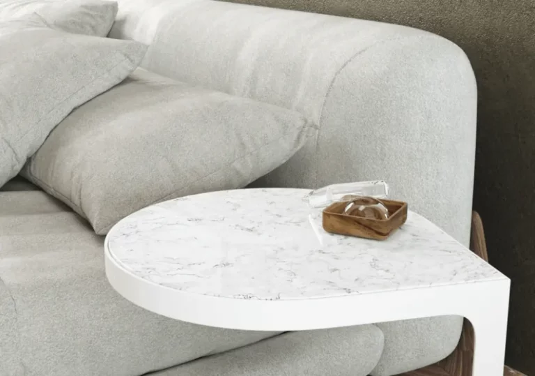 marble coffee table beside sofa